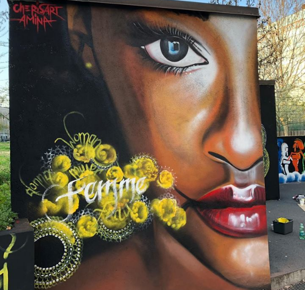 L’otto per le donne, il murales di Cheris e Amina assieme a Elica Rossa e i ragazzi del liceo artistico Michelangelo di Como